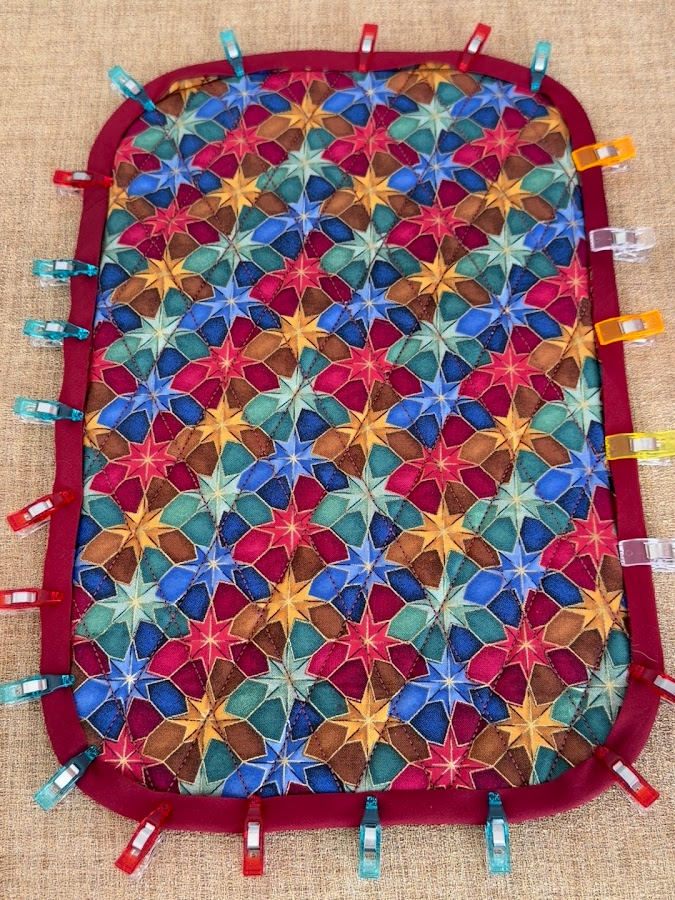 the organizer main panel with the biunding clipped to it all around