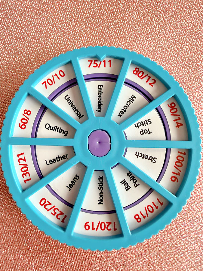 the needle noter showing the setting for embroidery needle 75/11