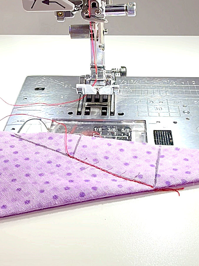 the piece of fabric after then stitch was done on the stitching line marked before