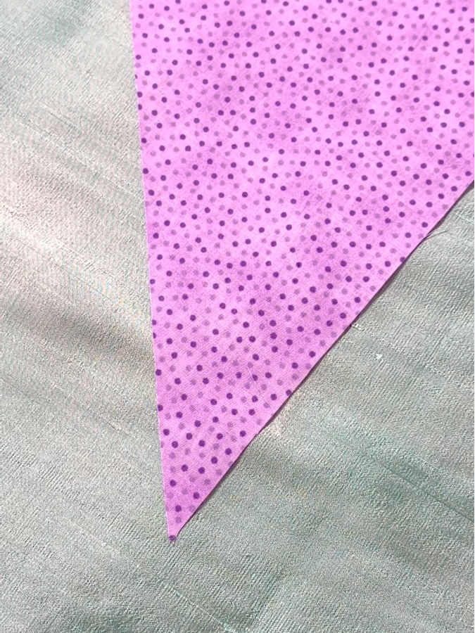 a piece of fabric having an acute corner