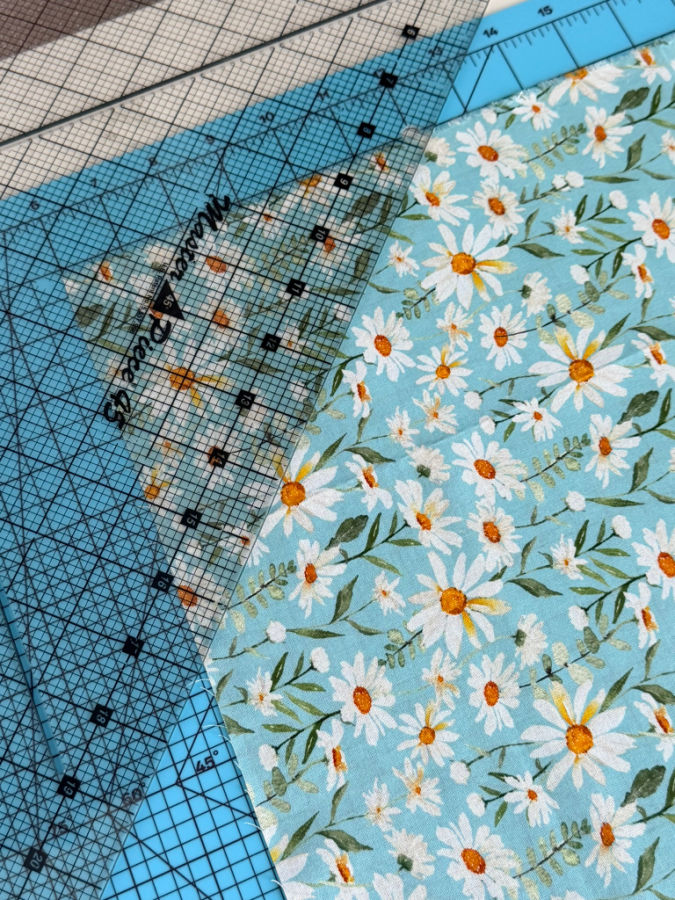 cutting the fabric strip at 45 degrees