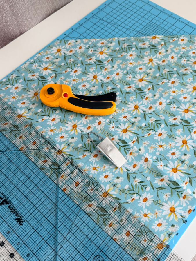 cutting the fabric strip across the grain