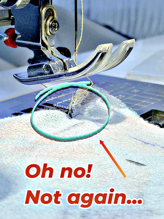 image of a piece of fabric being pulled into the hole in the plate of a sewing machine the words oh no not again at the bottom