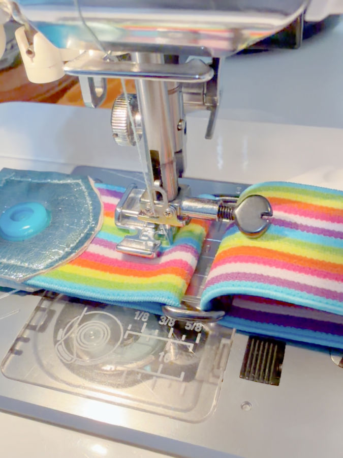 a sewing machine needle assembly while sewing the elastic