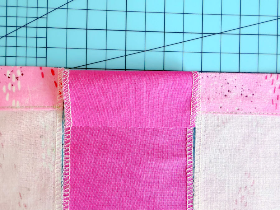 the insert fabric folded to verify that the length is appropriate for covering the existing hem