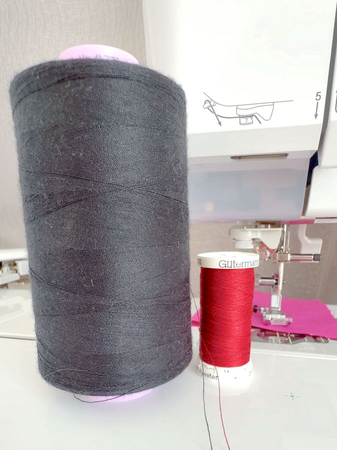two spools of thread one shows a smooth surface the other shows fuzziness visible even without magnification
