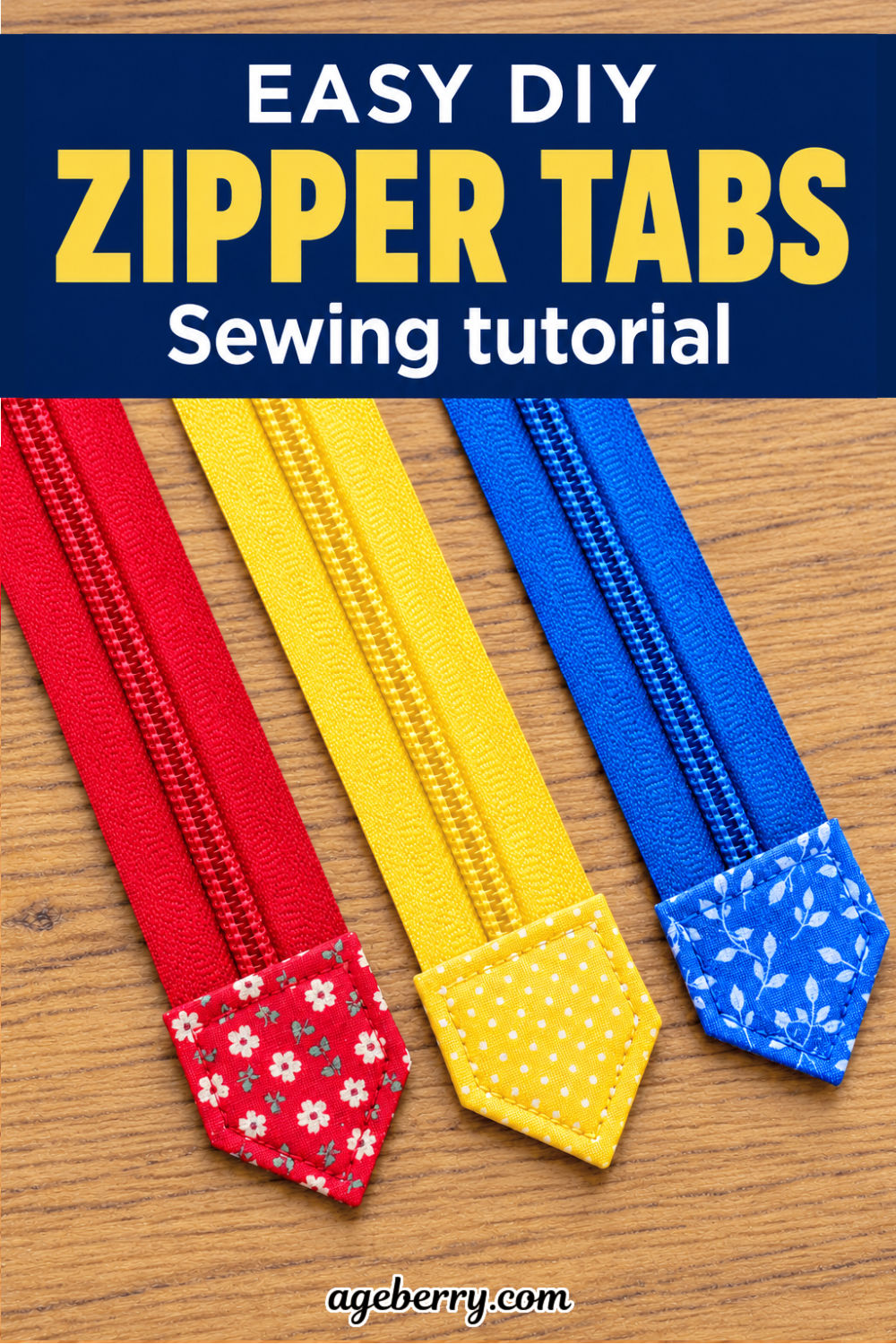 Red, yellow, and blue zippers lying side by side on a wooden surface with floral and polka-dot pointed fabric tabs covering the ends.